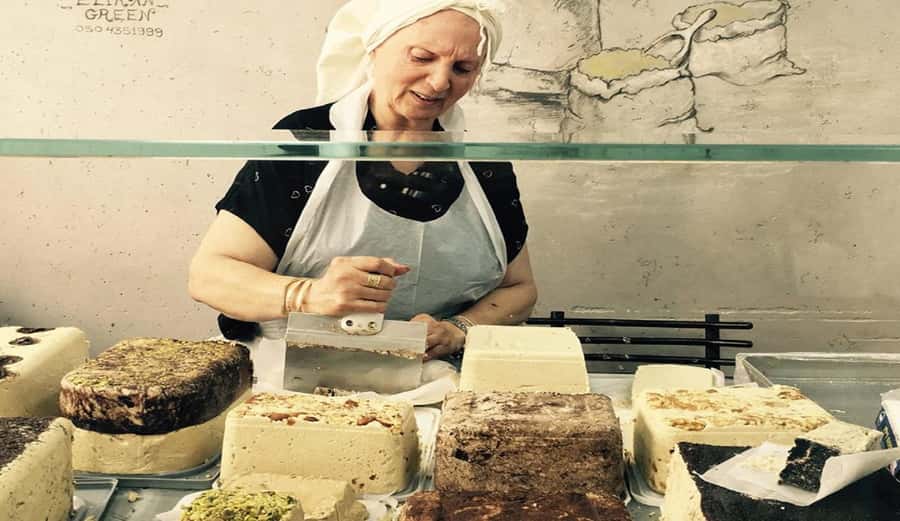 Tel Aviv: 2-Hour Levinsky Market Tour with Full Lunch - Tasting baked goods and regional snacks