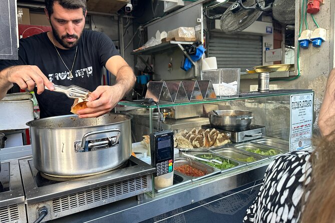 Tel Aviv: Carmel Market Food Tasting Tour “Shuk Hacarmel” - Tasting malawach with a Yemenite accent